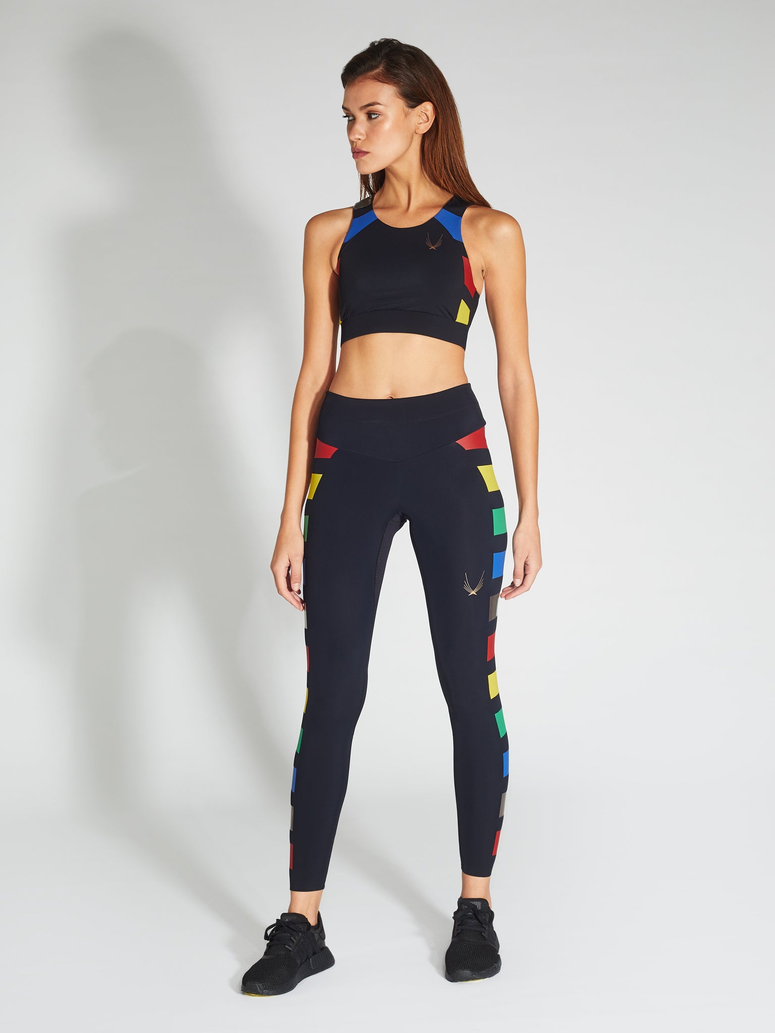 black odyssey gym crop with mesh back panel and coloured technical taping