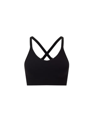 technical knit sports bra in black with padded removable cups and adjustable straps